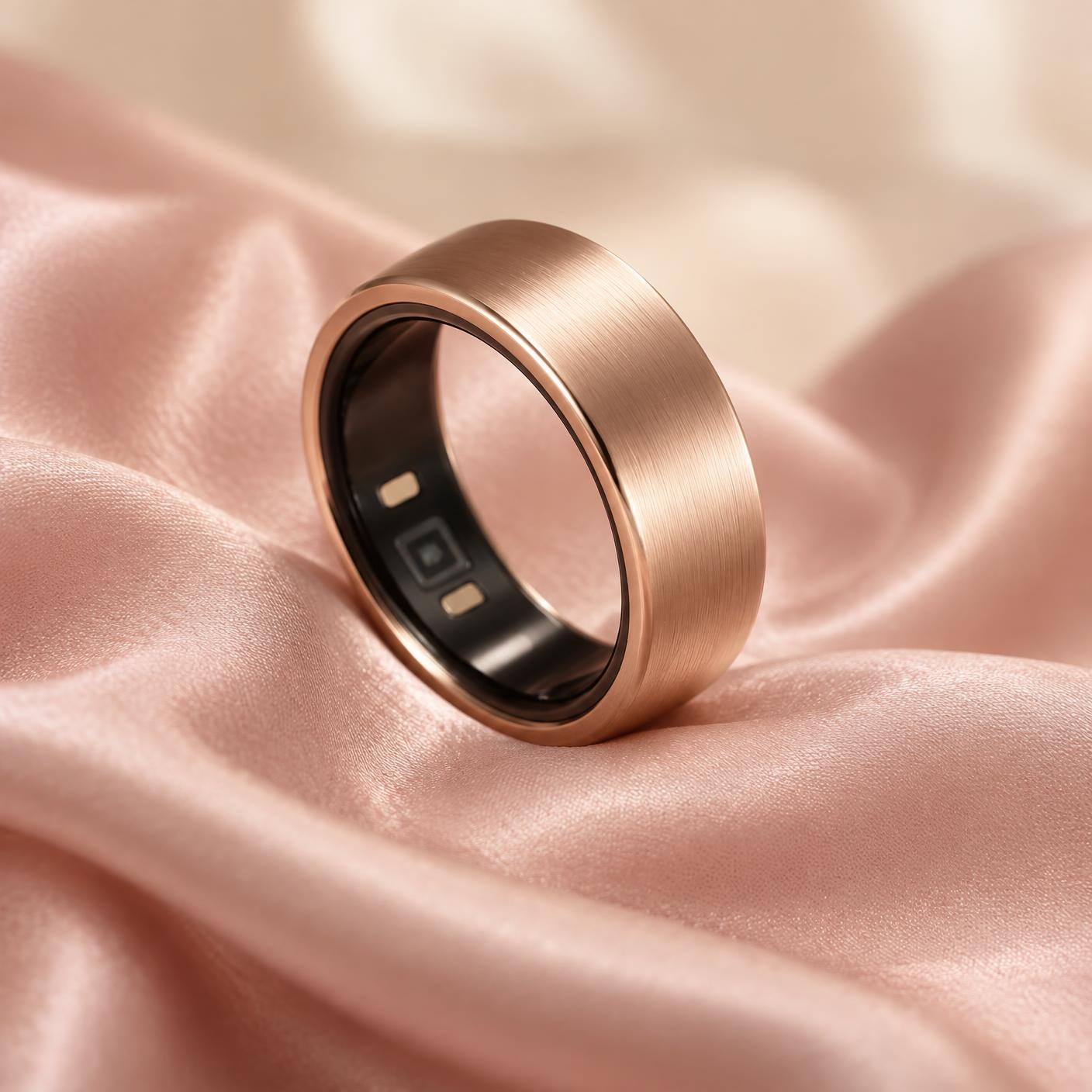The Coravella™ ring resting on blush silk